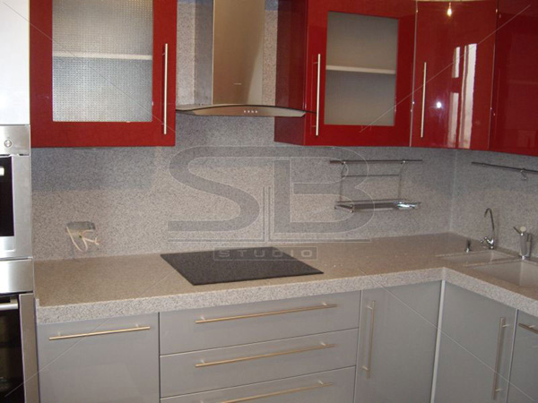 Фото угловой столешницы для кухни из искусственного камня Staron SG 420 Sanded Grey